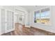 Office space featuring French doors, wood floors, and large windows at 355 Miramar Dr, York, SC 29745