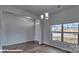 Spacious dining area with wood-look floors and view of entryway at 3913 Coleman Dr, Charlotte, NC 28215
