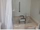 Accessible bathroom with shower stall and transfer chair at 401 Gillscreek Dr, Lancaster, SC 29720