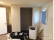 Unfinished bedroom with window and portable AC unit at 401 Gillscreek Dr, Lancaster, SC 29720