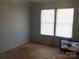 Bedroom with gray walls and new flooring at 401 Gillscreek Dr, Lancaster, SC 29720