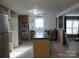 Updated kitchen with island and stainless steel appliances at 401 Gillscreek Dr, Lancaster, SC 29720