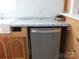 Kitchen features granite countertops and stainless steel dishwasher at 401 Gillscreek Dr, Lancaster, SC 29720