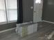 Living room with gray walls, new flooring, and window blinds at 401 Gillscreek Dr, Lancaster, SC 29720