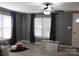 Living room with gray walls, new flooring, and window blinds at 401 Gillscreek Dr, Lancaster, SC 29720