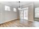 Dining area with sliding glass doors that provide ample natural light at 5108 Verona Rd # 94, Charlotte, NC 28213