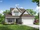 Charming two-story home featuring a gray exterior, well-manicured lawn, and an attached two-car garage at 5108 Verona Rd # 94, Charlotte, NC 28213