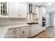 Modern kitchen featuring white cabinets, stylish backsplash, and stainless steel appliances at 5108 Verona Rd # 94, Charlotte, NC 28213