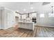 Stylish kitchen with white cabinets, a large island, and modern finishes at 5108 Verona Rd # 94, Charlotte, NC 28213
