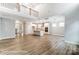 Open-concept living space featuring kitchen and fireplace, flooded with natural light at 5108 Verona Rd # 94, Charlotte, NC 28213