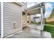Covered back patio with concrete flooring and view of the home's backyard at 5108 Verona Rd # 94, Charlotte, NC 28213