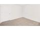 A simple bedroom has carpet and two doors for convenience at 5219 Reedy Ridge Rd, Charlotte, NC 28215