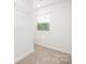 Sunlit bedroom offers carpet and a built-in closet at 5219 Reedy Ridge Rd, Charlotte, NC 28215