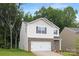 Beautiful two-story house with stone accents and a two-car garage at 5219 Reedy Ridge Rd, Charlotte, NC 28215
