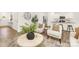 Bright living room with modern decor, stylish furnishings, and lots of natural light at 5219 Reedy Ridge Rd, Charlotte, NC 28215