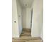 Simple hallway with light walls and wood-look flooring at 522 Birdie Haven Dr # 27, Chester, SC 29706