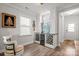 Elegant dining area with a built-in bar, wine rack, and stylish decor at 6289 Raven Rock Dr, Denver, NC 28037