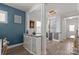 Open dining area with elegant decor featuring a dry bar and seamless flow for entertaining at 6289 Raven Rock Dr, Denver, NC 28037