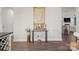 Stylish entryway featuring modern decor and a peek into a spacious living area at 6289 Raven Rock Dr, Denver, NC 28037
