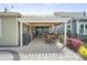 Private back patio with covered seating area and BBQ, perfect for entertaining Gathering and friends at 6289 Raven Rock Dr, Denver, NC 28037