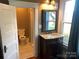 Clean bathroom with updated vanity and a toilet at 913 9Th Ne Ave, Hickory, NC 28601