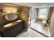 Elegant bathroom with double vanity and tub at 913 9Th Ne Ave, Hickory, NC 28601