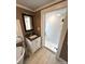 Updated bathroom with walk-in shower and a stylish vanity at 913 9Th Ne Ave, Hickory, NC 28601