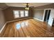 Spacious bedroom with hardwood floors and ceiling fan at 913 9Th Ne Ave, Hickory, NC 28601