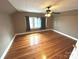 Spacious bedroom with hardwood floors, neutral colors, and natural lighting at 913 9Th Ne Ave, Hickory, NC 28601
