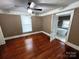 Spacious bedroom with hardwood floors and access to bathroom at 913 9Th Ne Ave, Hickory, NC 28601