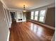 Dining room with hardwood floors and a built-in hutch at 913 9Th Ne Ave, Hickory, NC 28601