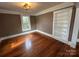 Hardwood floors, built-in shelves, and large windows at 913 9Th Ne Ave, Hickory, NC 28601