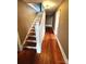 Hallway with hardwood floors that lead to the upper and lower levels at 913 9Th Ne Ave, Hickory, NC 28601