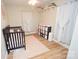 Bright Bedroom features a crib, changing table, and ample storage at 1008 E Sandy Ridge Rd, Monroe, NC 28112