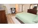 Spacious bedroom with a queen-size bed and built-in desk at 1008 E Sandy Ridge Rd, Monroe, NC 28112