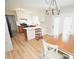 Modern kitchen with white cabinets, stainless steel appliances, and an island at 1008 E Sandy Ridge Rd, Monroe, NC 28112