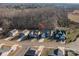 Aerial view of homes and surrounding wooded area at 102 Lake George Dr, Shelby, NC 28152