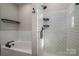 Bathroom with white subway tile shower and soaking tub at 102 Lake George Dr, Shelby, NC 28152