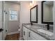 Bathroom with double vanity, granite countertop, and black fixtures at 102 Lake George Dr, Shelby, NC 28152