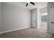 Bright bedroom with carpeted floor, neutral walls, and a window at 102 Lake George Dr, Shelby, NC 28152