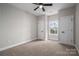 Bright bedroom with carpeted floor, neutral walls, and a window at 102 Lake George Dr, Shelby, NC 28152