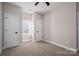 Bright bedroom with carpeted floor, neutral walls, and window at 102 Lake George Dr, Shelby, NC 28152