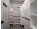 Walk-in closet with shelving and hanging rods at 102 Lake George Dr, Shelby, NC 28152