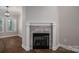 Modern fireplace with gray tile surround in living room at 102 Lake George Dr, Shelby, NC 28152