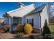 Gray siding, two-story house with covered patio and landscaping at 102 Lake George Dr, Shelby, NC 28152