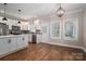 Modern white kitchen with island and stainless steel appliances at 102 Lake George Dr, Shelby, NC 28152