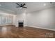 Open living space featuring hardwood floors and a fireplace at 102 Lake George Dr, Shelby, NC 28152