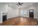 Spacious living room with hardwood floors and a fireplace at 102 Lake George Dr, Shelby, NC 28152