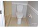 Clean bathroom with white toilet and hex tile floor at 1044 Tarlton Dr # 0, Shelby, NC 28052