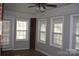 Bright sunroom with tile flooring and multiple windows at 1044 Tarlton Dr # 0, Shelby, NC 28052